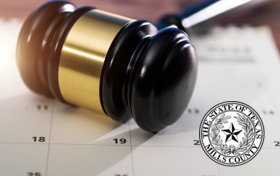 A gavel on a calendar next to the county seal